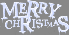 the word merry christmas is covered in ice and icicles