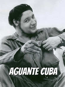 a black and white photo of a man with the words aguante cuba on it