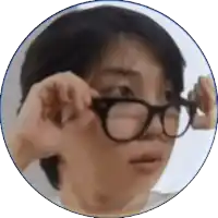 a close up of a person wearing glasses with a blue border