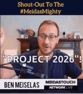 a man is talking into a microphone with the words " project 2026 " on the screen behind him