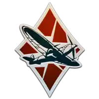 a sticker of a plane on a red and white diamond