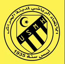 a yellow and black logo for usmh with arabic writing