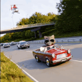 a cartoon cat is driving a red car with a license plate that says selfiecat 2