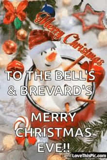 a christmas card with a snowman in a cup and the words merry christmas to the bell 's