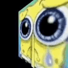 a close up of spongebob squarepants ' eyes with a black background .