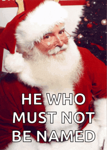 a picture of santa claus with the words he who must not be named below him