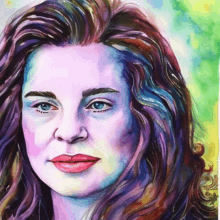 a colorful painting of a woman 's face with blue eyes