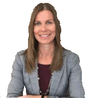 a woman wearing a grey jacket and a purple shirt is smiling for the camera