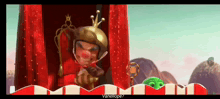 a cartoon character with a crown on his head is sitting on a throne and says " vanellope "