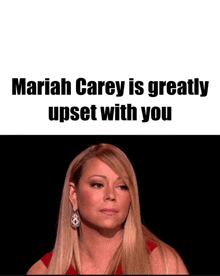 mariah carey is greatly upset with you with a woman in a red dress