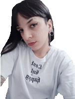 a woman wearing a white t-shirt that says i am a sad angel