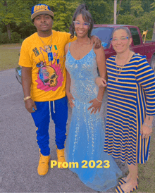 a group of people posing for a photo with prom 2023 written in yellow