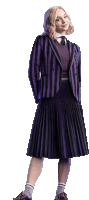 a woman wearing a purple and black striped jacket and pleated skirt