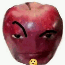 a red apple with a face drawn on it and a yellow smiley face .