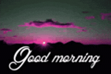 a picture of a sunset with the words `` good morning ''