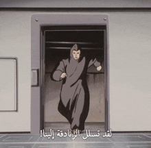 a man in a hooded robe is running through an elevator with arabic writing on it