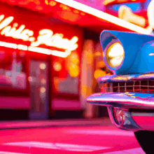 a blue car is parked in front of a neon sign that says ' hike ranch '