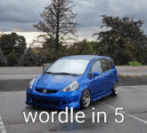a blue honda car is parked in a parking lot with the words wordle in 5 above it