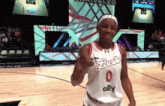 a female basketball player wearing a jersey with the number 0 on it
