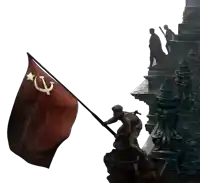 a statue of a man holding a red flag with a hammer and sickle