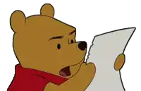 winnie the pooh is holding a piece of paper in his hand
