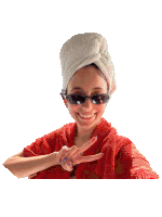 a woman with a towel wrapped around her head is wearing sunglasses and a red robe