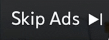 a black and white sign that says skip ads on it