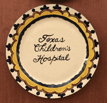 a plate that says texas children 's hospital