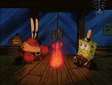 spongebob and mr krabs are sitting around a campfire in a room .