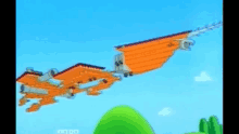 a cartoon plane is flying over a green hill with the letters nintendo on the bottom