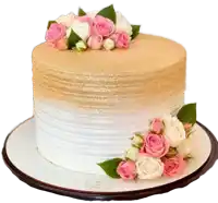 a white and gold cake with pink and white flowers on top