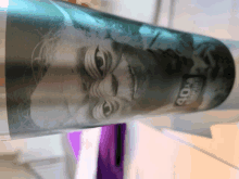 a picture of a man 's face is on a bottle with the year 2010