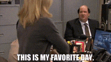 a woman is standing in front of a man in a suit and tie and says `` this is my favorite day '' .