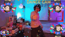 a man wearing headphones is dancing in a room with the words dance cam behind him