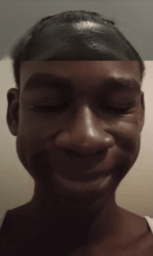 a close up of a person 's face with a funny face