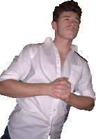 a young man wearing a white shirt with his hands folded