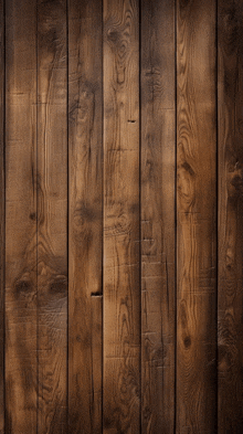 a close up of a wooden wall with a few knots in it