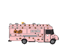 a pink food truck with the words eat love on the side