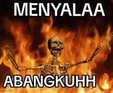 a skeleton is standing in front of a fire with the words `` menyalaa abangkuh '' .