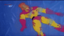 a cartoon character is surrounded by a rainbow of colors