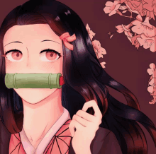 a girl with a bamboo tube in her mouth