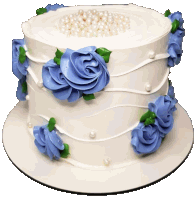 a white cake decorated with blue roses and pearls