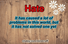 a wooden background with flowers and the word hate on it