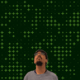 a man looking up at the number 32