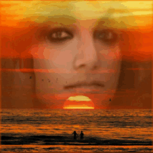 a painting of a woman 's face and the sunset over the ocean