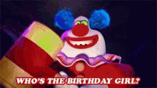 a clown with blue hair is holding a gift box and asking who 's the birthday girl