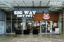 a restaurant called big way hot pot is located in a building