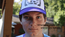 a man wearing a purple and white hat that says " see you on the other side "