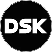 a black circle with the word dsk in white on it