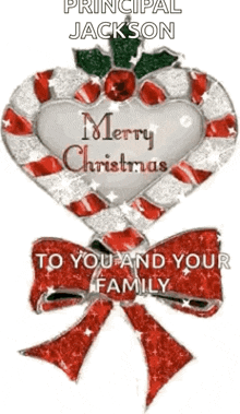 a candy cane in the shape of a heart says merry christmas to you and your family .